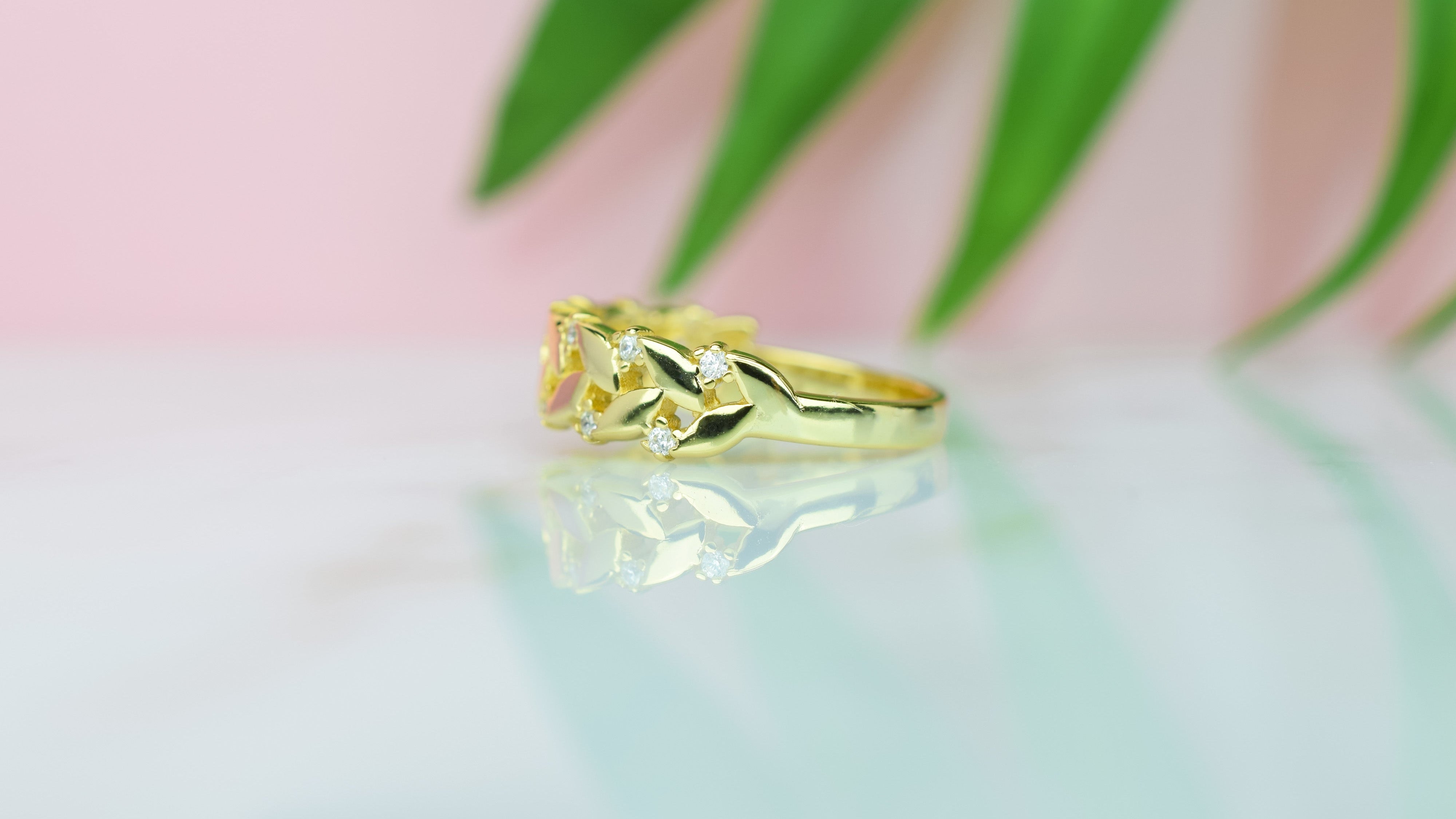 gouden statement ring, leaf ring goud, zilveren ring met blaadjes, blaadjes ring met stenen, blaadjes ring rose goud, gouden ring met blaadjes en stenen