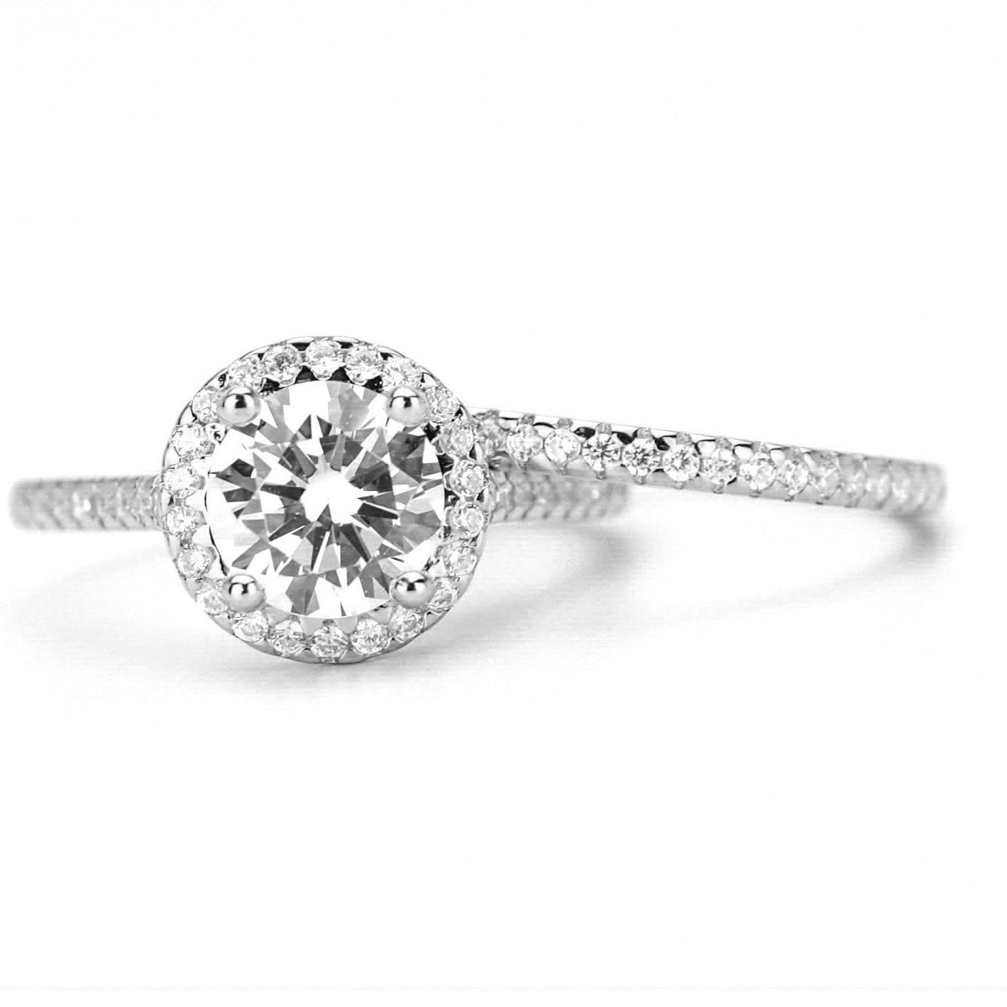 verlovingsring goud, gouden verlovingsring, zilveren verlovingsring, rosegouden verlovingsring, ring met stenen, solitaire zilveren ring met solitaire steen, vierkante ring, zilveren vierkante ring, gouden vierkante ring, ringenset goud, zilveren ringenset solitaire, Ringset