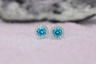 Aquamarijn soorbellen, oorbellen aquamarijn goud, zilveren aquamarijn oorbellen, blauwe oorbellen, ronde oorsieraden, aquamarijn sieraden, birthstone oorbellen, geboortesteen oorbellen maart, natturstenen aquamarijn, halo oorbellen, aquamarijn rosegoud oorbellen