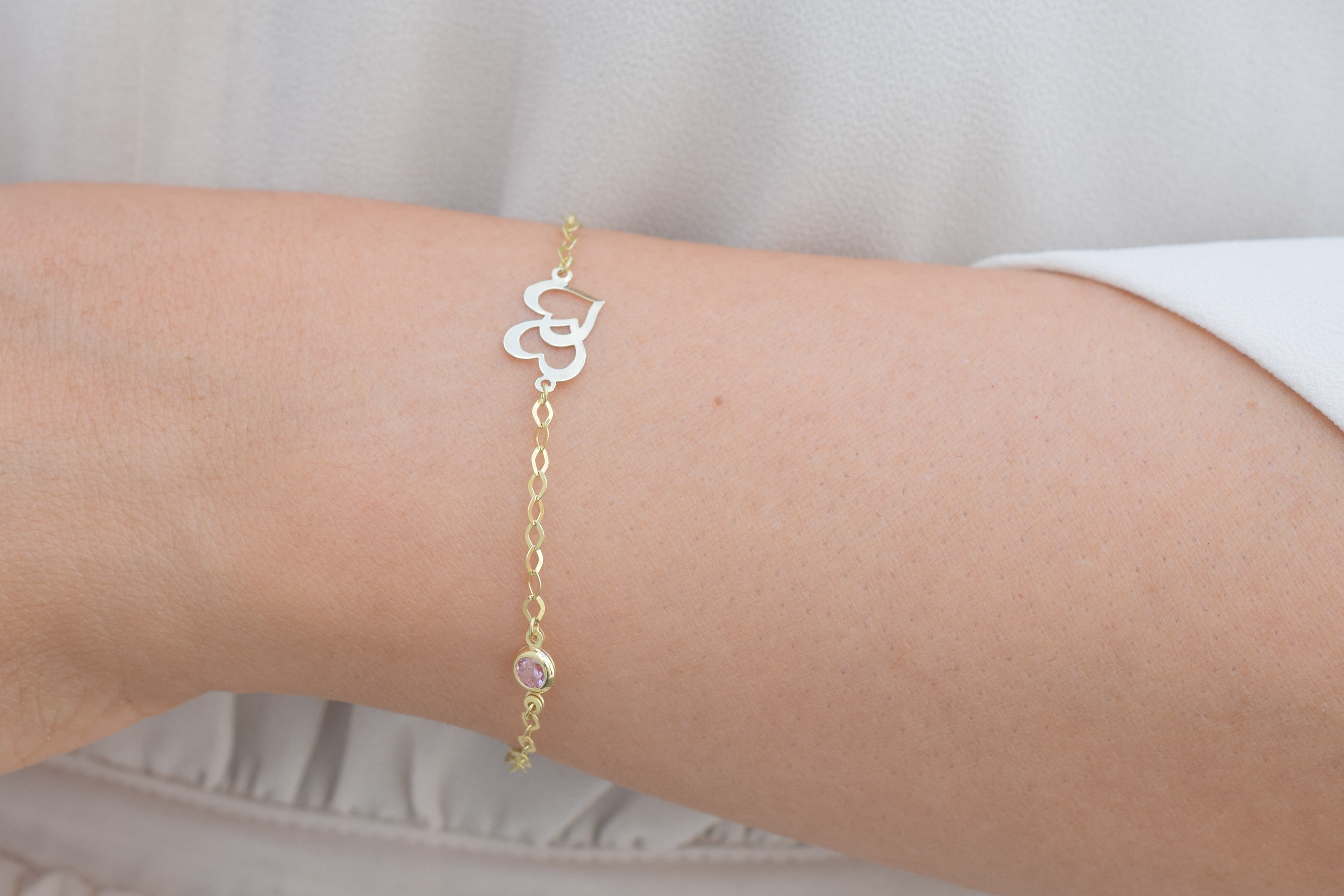 Dames gouden armband, dames armband, hartjes met steentje armband, dames armband met roze steentje en hartjes, dubbele hart armband, gouden dubbele hart met steen armband, prachtige dames armband